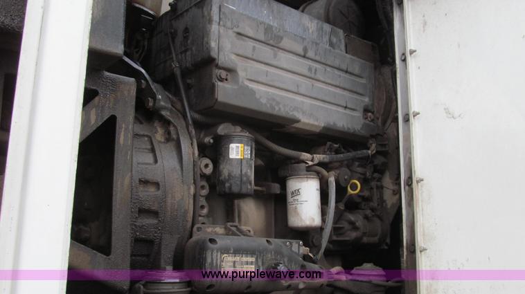 image for item G2173 2003 Freightliner FL70 truck with Schwarze M6000 sweeper