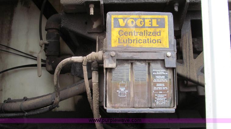 image for item G2173 2003 Freightliner FL70 truck with Schwarze M6000 sweeper