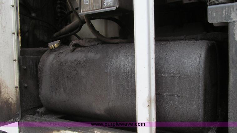 image for item G2173 2003 Freightliner FL70 truck with Schwarze M6000 sweeper