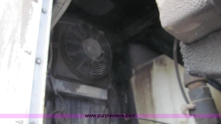 image for item G2173 2003 Freightliner FL70 truck with Schwarze M6000 sweeper