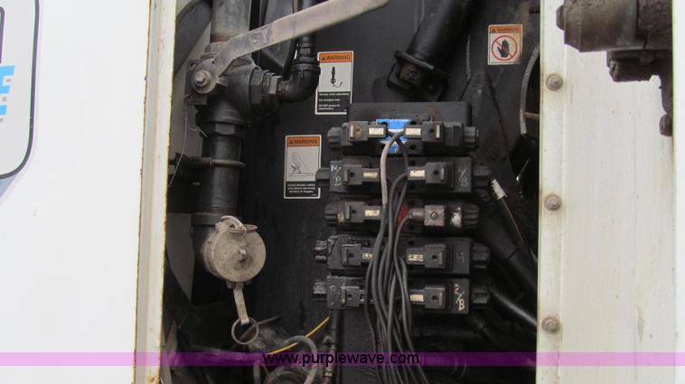 image for item G2173 2003 Freightliner FL70 truck with Schwarze M6000 sweeper