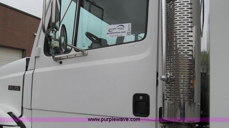 image for item G2173 2003 Freightliner FL70 truck with Schwarze M6000 sweeper