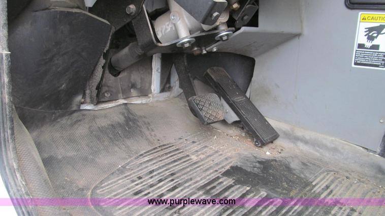 image for item G2173 2003 Freightliner FL70 truck with Schwarze M6000 sweeper