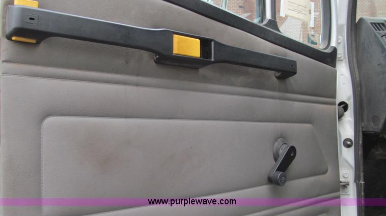 image for item G2173 2003 Freightliner FL70 truck with Schwarze M6000 sweeper