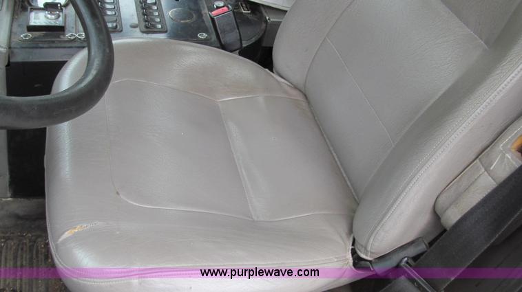 image for item G2173 2003 Freightliner FL70 truck with Schwarze M6000 sweeper