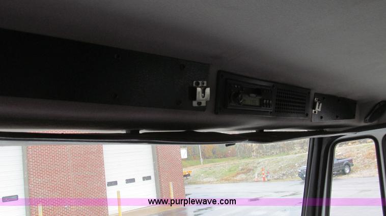 image for item G2173 2003 Freightliner FL70 truck with Schwarze M6000 sweeper