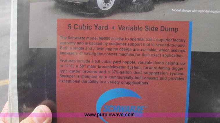 image for item G2173 2003 Freightliner FL70 truck with Schwarze M6000 sweeper