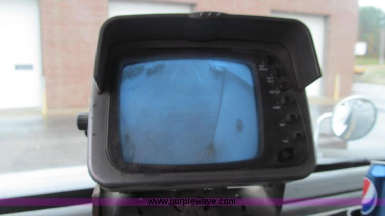 image for item G2173 2003 Freightliner FL70 truck with Schwarze M6000 sweeper