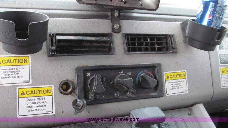 image for item G2173 2003 Freightliner FL70 truck with Schwarze M6000 sweeper