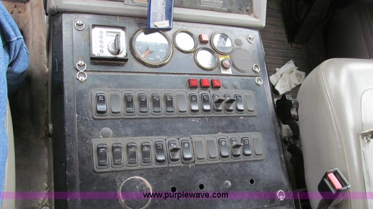 image for item G2173 2003 Freightliner FL70 truck with Schwarze M6000 sweeper