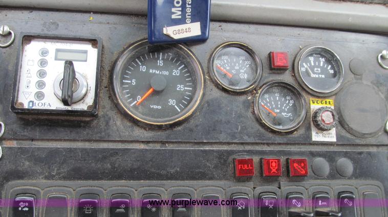 image for item G2173 2003 Freightliner FL70 truck with Schwarze M6000 sweeper