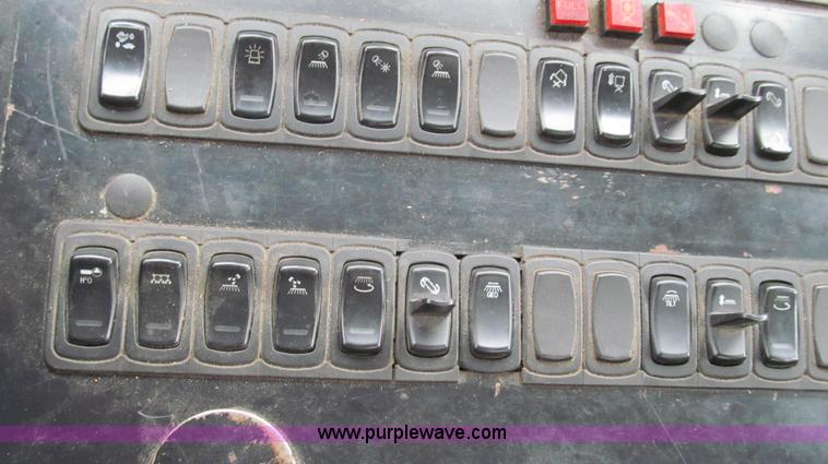 image for item G2173 2003 Freightliner FL70 truck with Schwarze M6000 sweeper