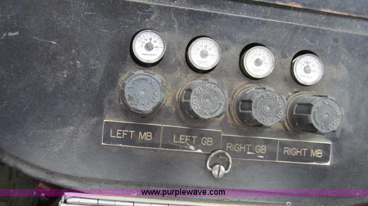 image for item G2173 2003 Freightliner FL70 truck with Schwarze M6000 sweeper