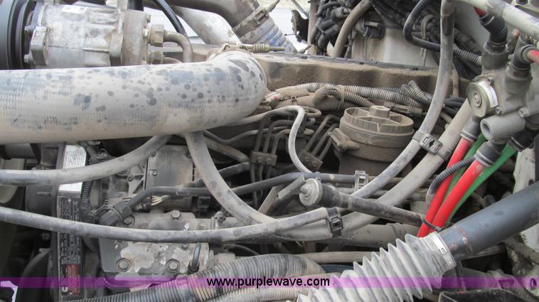 image for item G2173 2003 Freightliner FL70 truck with Schwarze M6000 sweeper