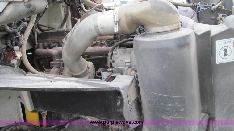 image for item G2173 2003 Freightliner FL70 truck with Schwarze M6000 sweeper