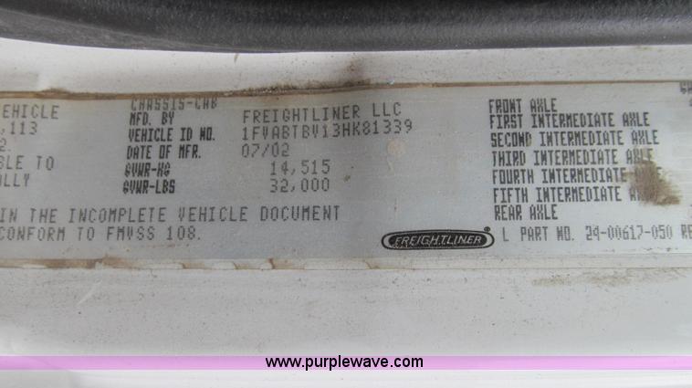 image for item G2173 2003 Freightliner FL70 truck with Schwarze M6000 sweeper