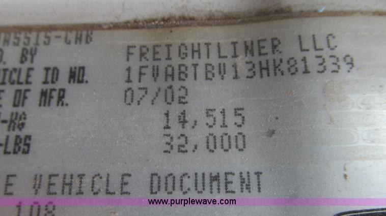 image for item G2173 2003 Freightliner FL70 truck with Schwarze M6000 sweeper