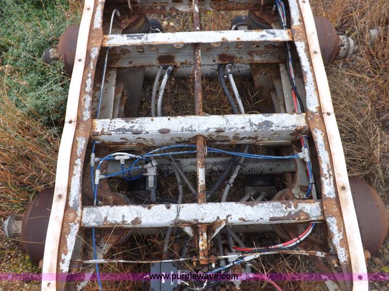 image for item I8317 (3) assorted semi trailer axles