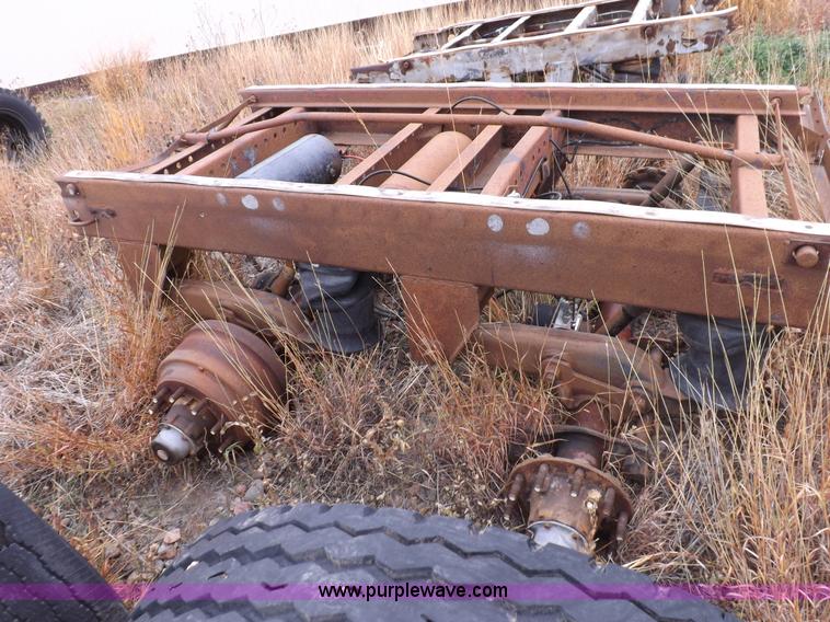 image for item I8317 (3) assorted semi trailer axles