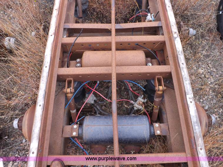 image for item I8317 (3) assorted semi trailer axles