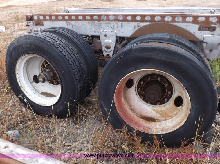image for item I8317 (3) assorted semi trailer axles