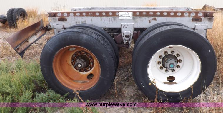 image for item I8317 (3) assorted semi trailer axles