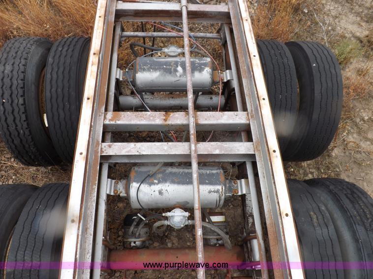 image for item I8317 (3) assorted semi trailer axles