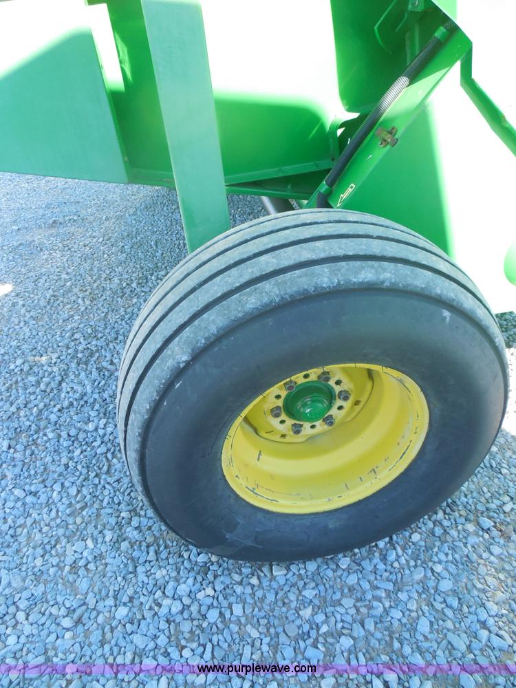 image for item F3261 2002 John Deere 567 round baler