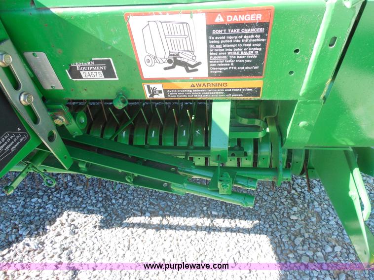 image for item F3261 2002 John Deere 567 round baler