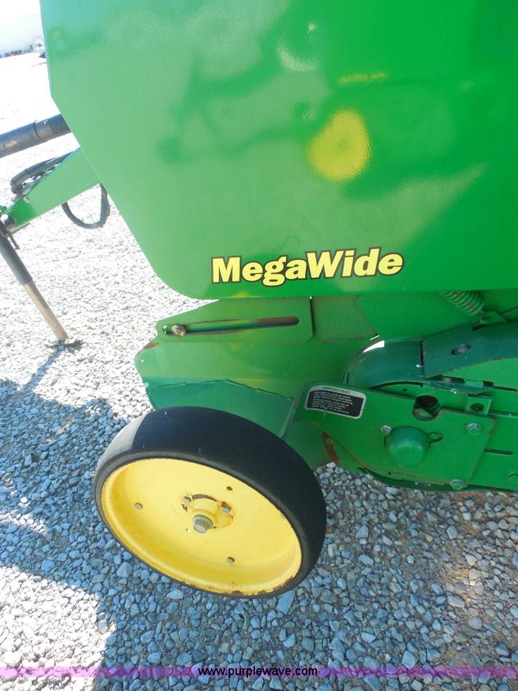 image for item F3262 2002 John Deere 567 round baler