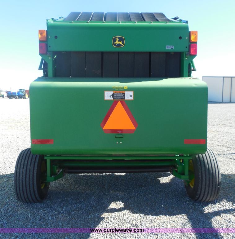 image for item F3262 2002 John Deere 567 round baler