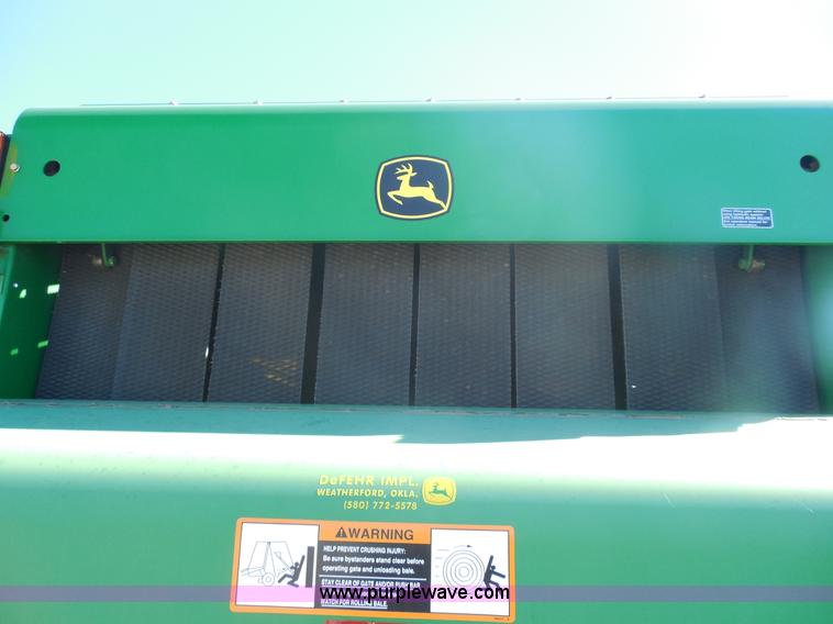 image for item F3262 2002 John Deere 567 round baler