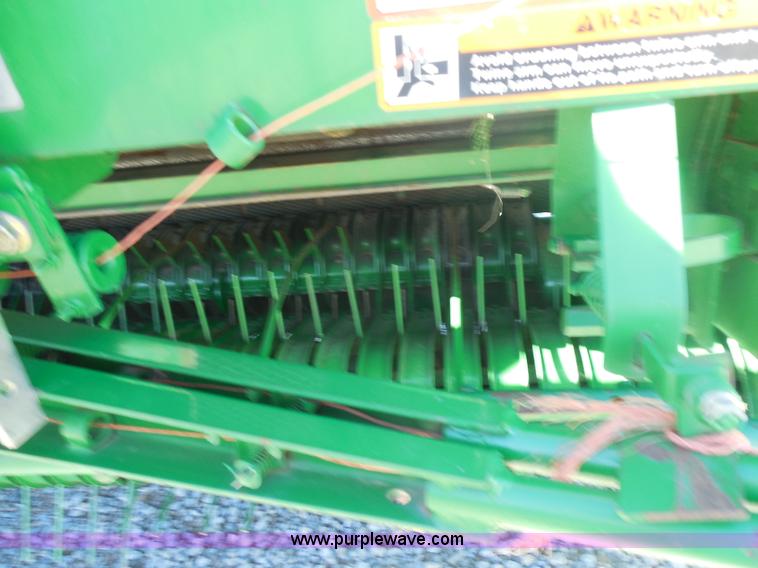 image for item F3262 2002 John Deere 567 round baler