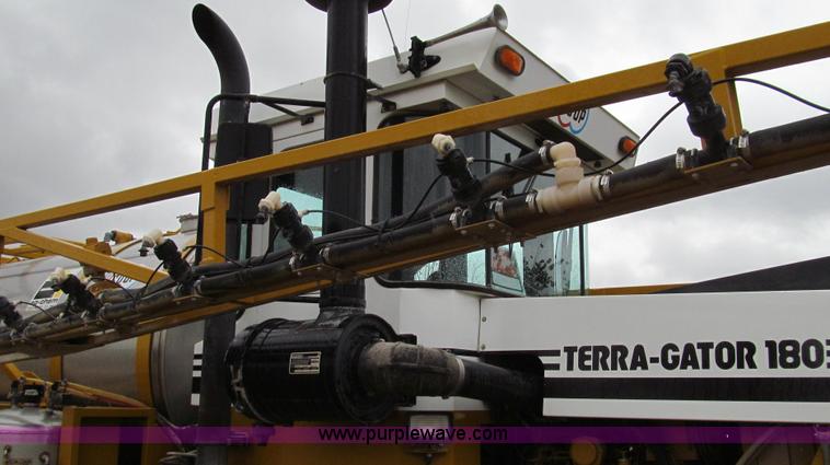 image for item G2161 1996 Ag-Chem TerraGator 1803 self-propelled sprayer floater