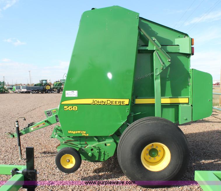 image for item G5853 2009 John Deere 568 round baler