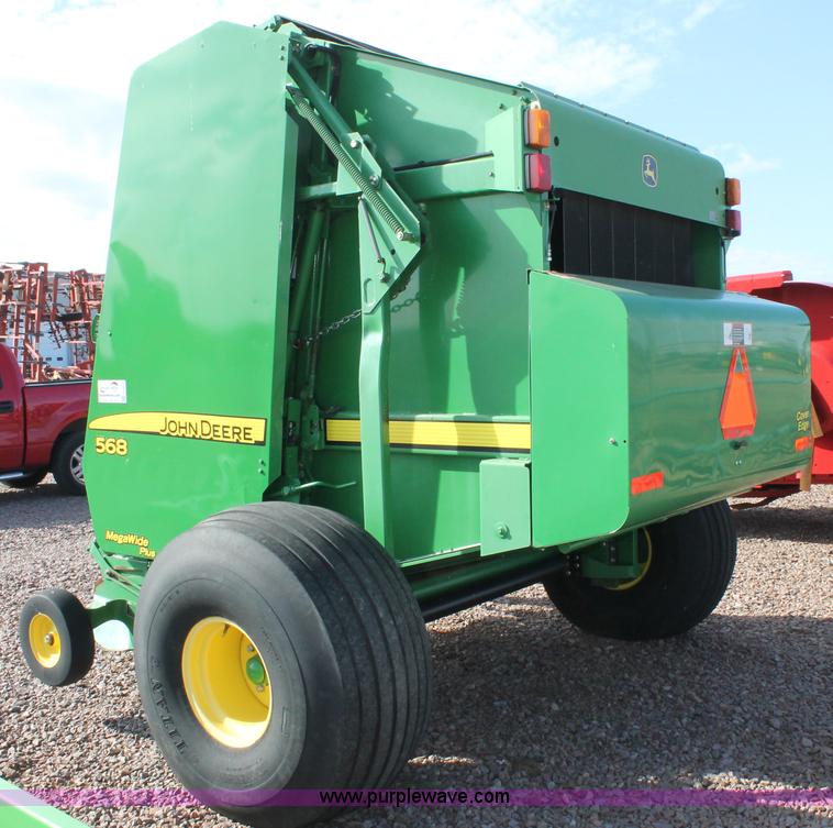 image for item G5853 2009 John Deere 568 round baler