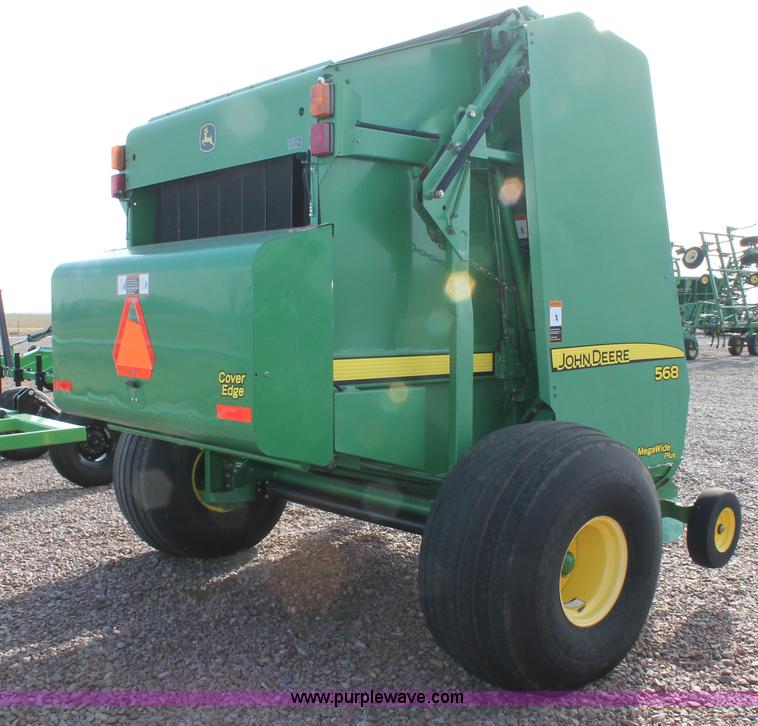 image for item G5853 2009 John Deere 568 round baler