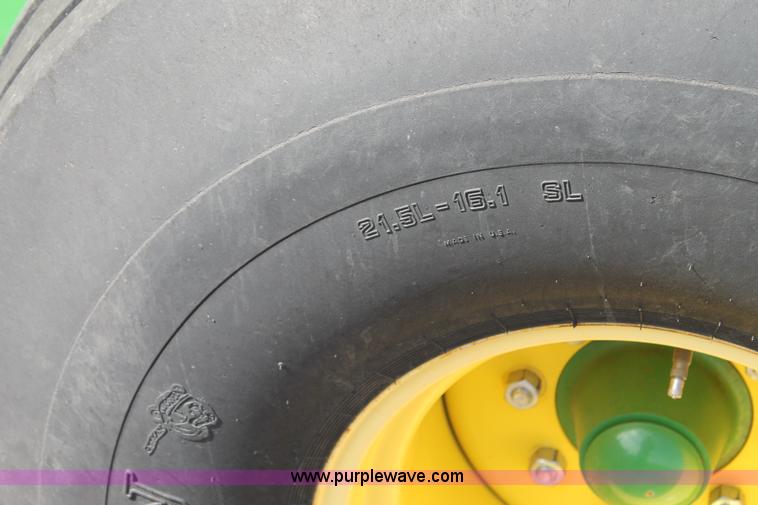 image for item G5853 2009 John Deere 568 round baler