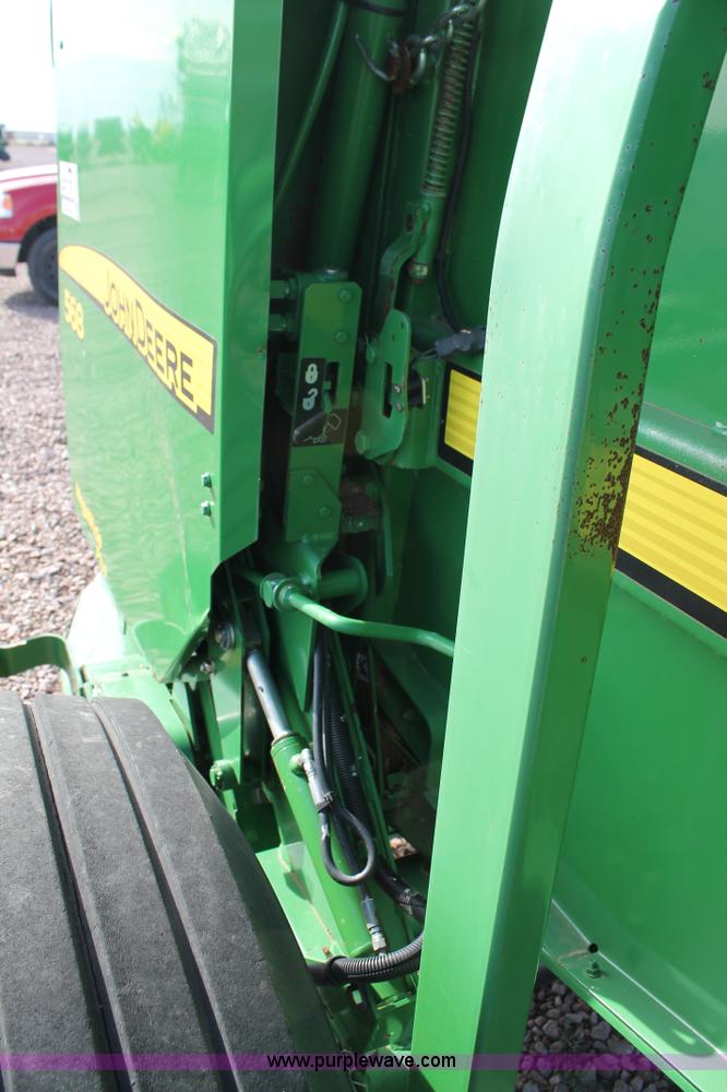 image for item G5853 2009 John Deere 568 round baler