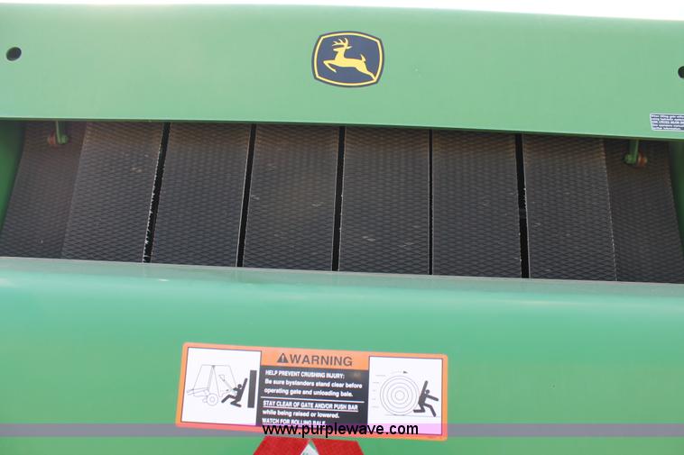 image for item G5853 2009 John Deere 568 round baler