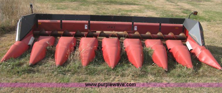 image for item H4371 1999 Case 1083 eight row corn head