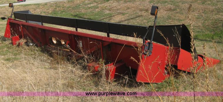 image for item H4371 1999 Case 1083 eight row corn head