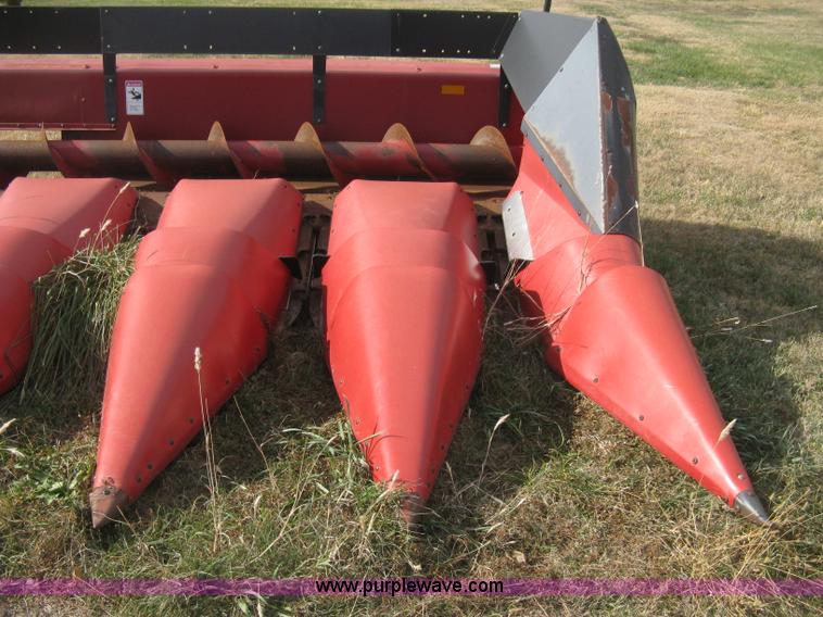 image for item H4371 1999 Case 1083 eight row corn head
