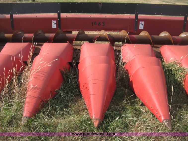 image for item H4371 1999 Case 1083 eight row corn head