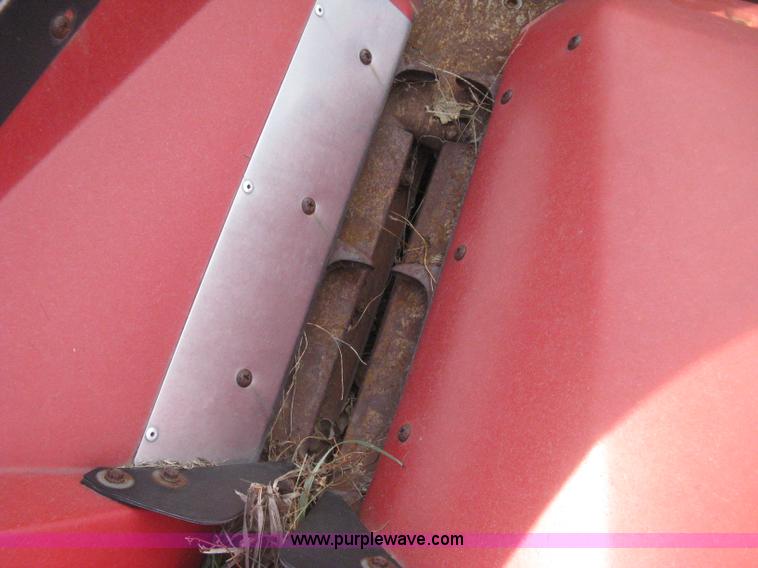 image for item H4371 1999 Case 1083 eight row corn head