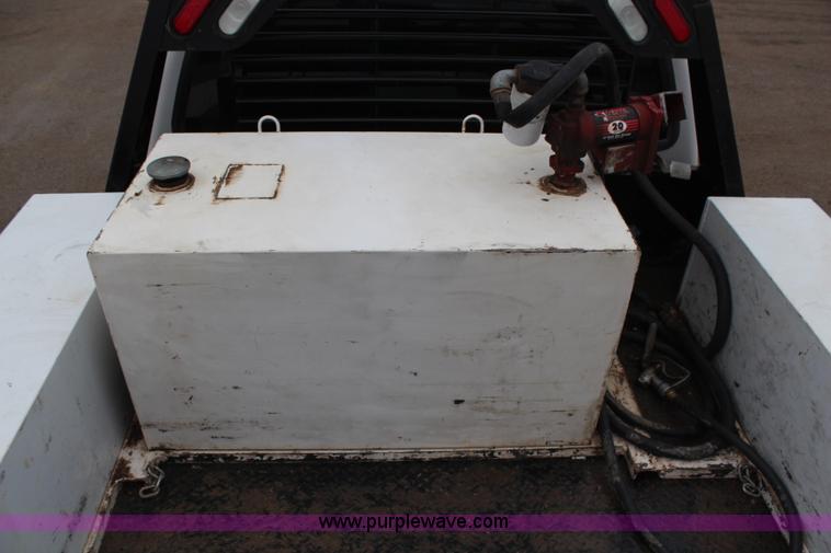 image for item H7959 2003 Ford F350 Super Duty XLT SuperCab flatbed pickup truck