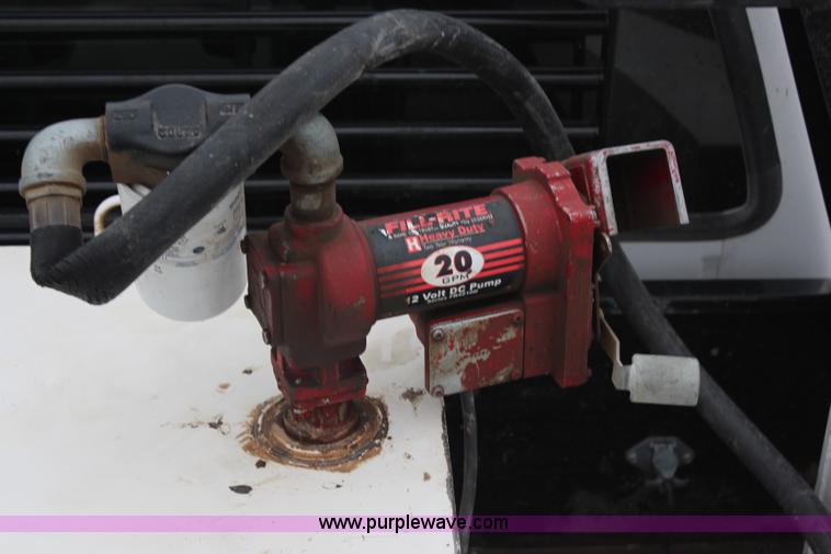 image for item H7959 2003 Ford F350 Super Duty XLT SuperCab flatbed pickup truck