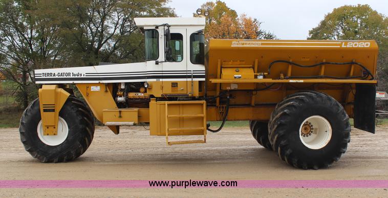 image for item H7961 1992 Ag-Chem TerraGator 1603T dry fertilizer spreader truck