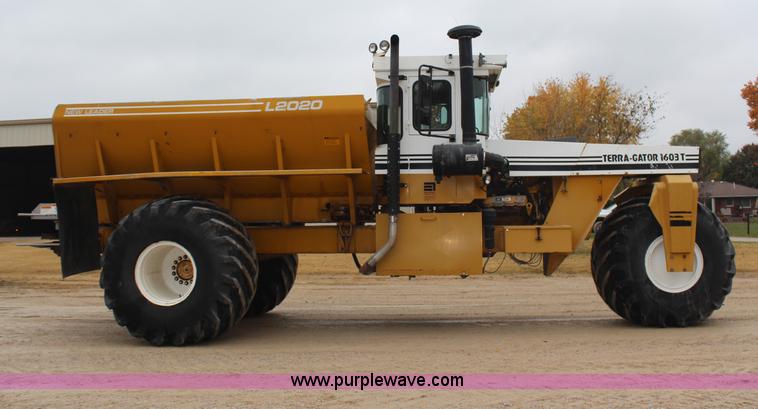 image for item H7961 1992 Ag-Chem TerraGator 1603T dry fertilizer spreader truck