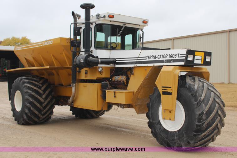 image for item H7961 1992 Ag-Chem TerraGator 1603T dry fertilizer spreader truck